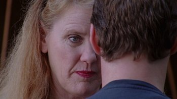 Movie still from “Junebug” (2005), directed by Phil Morrison – A woman's face and a man's face; Close Up shot, Over the shoulder angle