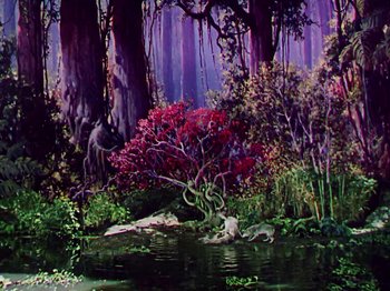 Movie still from “The Jungle Book” (1942), directed by Zoltan Korda – A painting of trees and bushes in the water; Extreme Wide shot, High angle