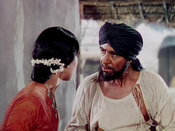 Movie still from “The Jungle Book” (1942), directed by Zoltan Korda – A man and a woman talking to each other; Close Up shot, Over the shoulder angle
