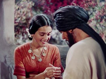 Movie still from “The Jungle Book” (1942), directed by Zoltan Korda – A man and a woman are talking to each other; Close Up shot, Overhead angle