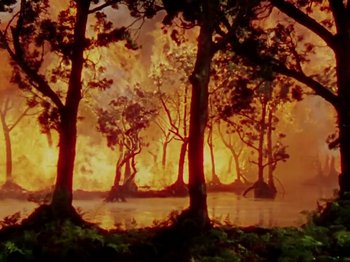 Movie still from “The Jungle Book” (1942), directed by Zoltan Korda – A forest fire is burning in the middle of the night; Extreme Wide shot, Low angle