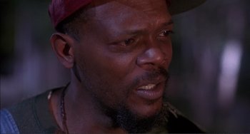 Movie still from “Jungle Fever” (1991), directed by Spike Lee – A person with a beard; Close Up shot, Low angle