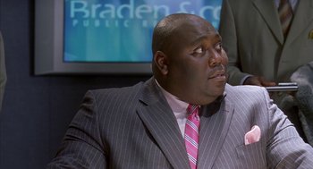 Movie still from “Just My Luck” (2006), directed by Donald Petrie – A man in a suit and a pink tie; Close Up shot, Low angle