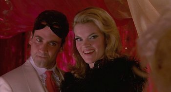 Movie still from “Just My Luck” (2006), directed by Donald Petrie – A man and a woman posing for a picture; Close Up shot, Low angle