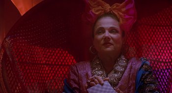 Movie still from “Just My Luck” (2006), directed by Donald Petrie – A woman with a large bow in her hair; Close Up shot, Low angle