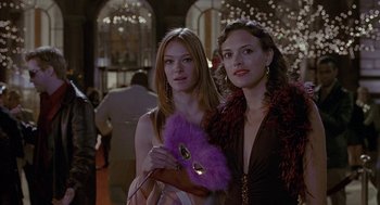 Movie still from “Just My Luck” (2006), directed by Donald Petrie – Two beautiful young women standing next to each other; Medium shot, Over the shoulder angle