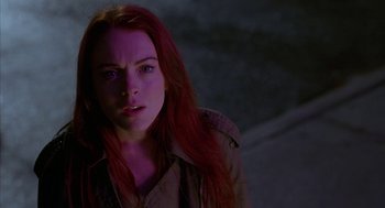 Movie still from “Just My Luck” (2006), directed by Donald Petrie – A person with long red hair; Close Up shot, Over the shoulder angle