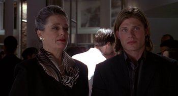 Movie still from “Just My Luck” (2006), directed by Donald Petrie – A woman and a man standing next to each other in a room; Close Up shot, Low angle