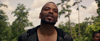 Movie still from “Keanu” (2016), directed by Peter Atencio – A person wearing a leather jacket; Close Up shot, Over the shoulder angle