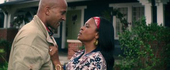 Movie still from “Keanu” (2016), directed by Peter Atencio – A man and a woman standing next to each other; Close Up shot, Over the shoulder angle