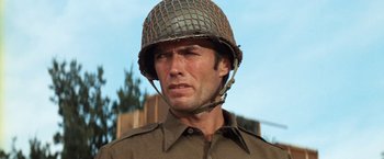 Movie still from “Kelly's Heroes” (1970), directed by Brian G. Hutton – A person wearing a helmet; Close Up shot, Low angle