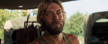 Movie still from “Kelly's Heroes” (1970), directed by Brian G. Hutton – A person with a beard; Close Up shot, Low angle