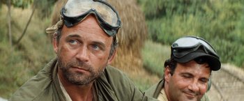 Movie still from “Kelly's Heroes” (1970), directed by Brian G. Hutton – A man with a pair of goggles on his head; Close Up shot, Low angle