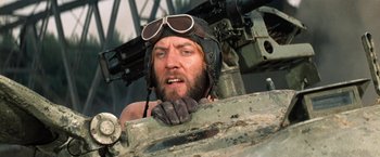 Movie still from “Kelly's Heroes” (1970), directed by Brian G. Hutton – A person with a helmet on; Close Up shot, Low angle