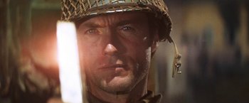 Movie still from “Kelly's Heroes” (1970), directed by Brian G. Hutton – A person wearing a helmet; Close Up shot, Low angle