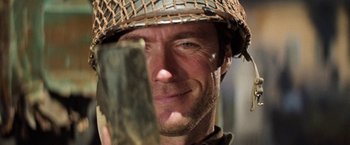 Movie still from “Kelly's Heroes” (1970), directed by Brian G. Hutton – A person wearing a helmet; Close Up shot, Low angle