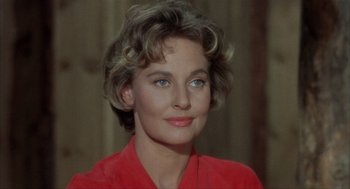 Movie still from “Kid Galahad” (1962), directed by Phil Karlson – A person wearing a red shirt; Close Up shot, Over the shoulder angle