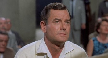 Movie still from “Kid Galahad” (1962), directed by Phil Karlson – An older man in a white dress shirt looking up; Close Up shot, Low angle