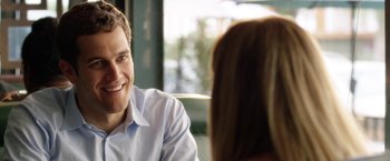 Movie still from “Kidnap” (2017), directed by Luis Prieto – A man and a woman sitting at a table talking to each other; Close Up shot, Over the shoulder angle