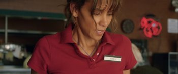 Movie still from “Kidnap” (2017), directed by Luis Prieto – A person wearing a red shirt; Close Up shot, High angle