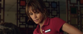 Movie still from “Kidnap” (2017), directed by Luis Prieto – A woman in a red shirt is looking at the camera; Close Up shot, Over the shoulder angle