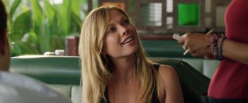 Movie still from “Kidnap” (2017), directed by Luis Prieto – A beautiful blonde woman sitting in a booth; Close Up shot, Over the shoulder angle