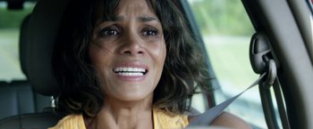 Movie still from “Kidnap” (2017), directed by Luis Prieto – A person in a car crying; Close Up shot, Overhead angle