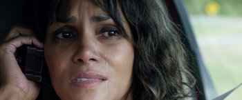 Movie still from “Kidnap” (2017), directed by Luis Prieto – A person with a tear in her eye; Close Up shot, Overhead angle