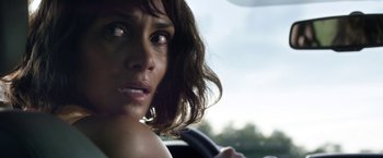 Movie still from “Kidnap” (2017), directed by Luis Prieto – A person in a car holding a steering wheel; Close Up shot, Over the shoulder angle