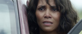 Movie still from “Kidnap” (2017), directed by Luis Prieto – A person with long black hair; Close Up shot, High angle