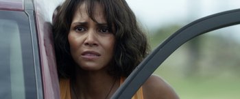 Movie still from “Kidnap” (2017), directed by Luis Prieto – A person holding a sword; Close Up shot, Over the shoulder angle