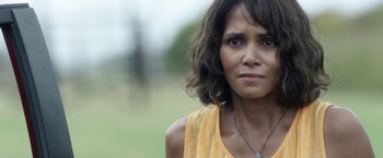 Movie still from “Kidnap” (2017), directed by Luis Prieto – A person wearing a yellow shirt; Close Up shot, Over the shoulder angle