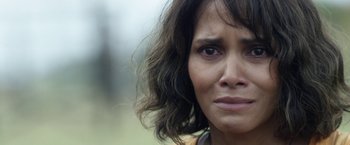 Movie still from “Kidnap” (2017), directed by Luis Prieto – A woman's face with a blurry background; Close Up shot, Over the shoulder angle