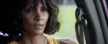 Movie still from “Kidnap” (2017), directed by Luis Prieto – A person with short brown hair; Close Up shot, Over the shoulder angle
