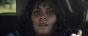 Movie still from “Kidnap” (2017), directed by Luis Prieto – A woman's face in a dark room; Close Up shot, Overhead angle