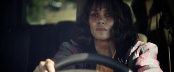 Movie still from “Kidnap” (2017), directed by Luis Prieto – A woman sitting in the drivers seat of a car; Close Up shot, Over the shoulder angle