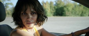 Movie still from “Kidnap” (2017), directed by Luis Prieto – A person sitting in a car on the road; Close Up shot, High angle