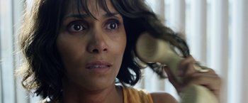 Movie still from “Kidnap” (2017), directed by Luis Prieto – A person blow drying her hair; Close Up shot, Overhead angle