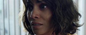 Movie still from “Kidnap” (2017), directed by Luis Prieto – A woman's face with long dark hair; Close Up shot, High angle