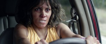 Movie still from “Kidnap” (2017), directed by Luis Prieto – A person driving a car; Close Up shot, High angle