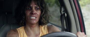 Movie still from “Kidnap” (2017), directed by Luis Prieto – A woman sitting in the driver's seat of a car; Close Up shot, High angle