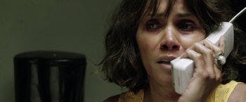 Movie still from “Kidnap” (2017), directed by Luis Prieto – A person holding a cell phone; Close Up shot, Overhead angle