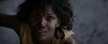Movie still from “Kidnap” (2017), directed by Luis Prieto – A person with blood on her face; Close Up shot, Overhead angle