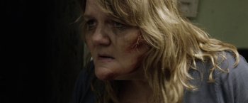 Movie still from “Kidnap” (2017), directed by Luis Prieto – A person's face covered in blood; Close Up shot, High angle