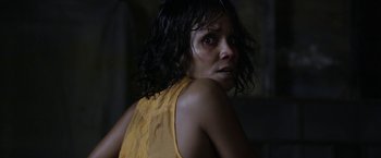 Movie still from “Kidnap” (2017), directed by Luis Prieto – A person wearing a yellow shirt; Close Up shot, Over the shoulder angle