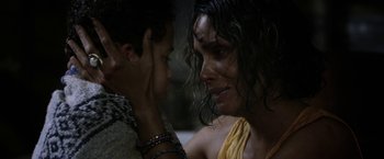 Movie still from “Kidnap” (2017), directed by Luis Prieto – A woman with wet hair is looking at another woman's face; Close Up shot, Over the shoulder angle