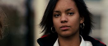 Movie still from “Kidulthood” (2006), directed by Menhaj Huda – A person wearing a jacket; Close Up shot, Low angle