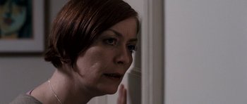 Movie still from “Kidulthood” (2006), directed by Menhaj Huda – A person looking at the camera; Close Up shot, Over the shoulder angle