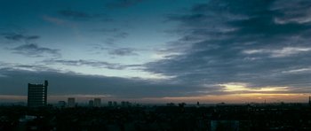 Movie still from “Kidulthood” (2006), directed by Menhaj Huda – A view of a city at dusk or dawn; Extreme Wide shot, Low angle