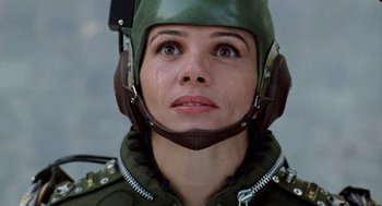Movie still from “Kika” (1993), directed by Pedro Almodóvar – A person wearing a helmet; Close Up shot, Low angle
